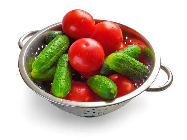 Cucumbers and tomatoes in steel bowl — Stock Photo, Image