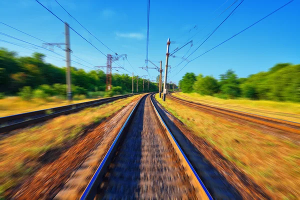 Railroad tracks in motion — Stock Photo, Image