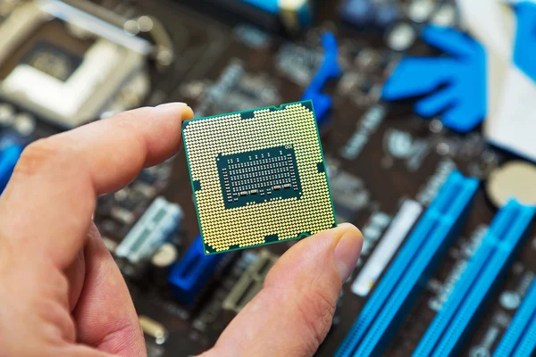 CPU in hand — Stockfoto