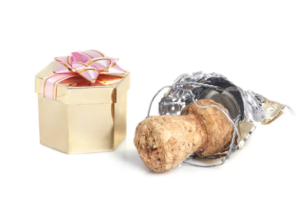 Champagne cork and gift — Stock Photo, Image