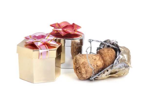 Champagne cork and gift — Stock Photo, Image