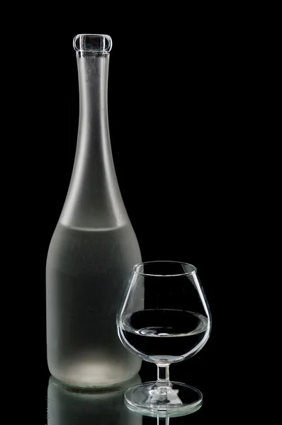 Botella de vino y vidrio —  Fotos de Stock