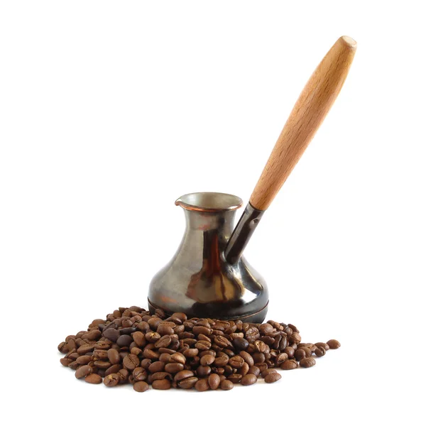 Coffee beans and cezve — Stock Photo, Image