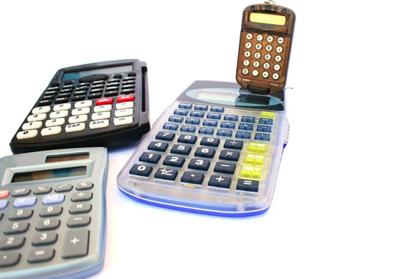 Cuatro Calculadoras Aisladas Sobre Fondo Blanco — Foto de Stock