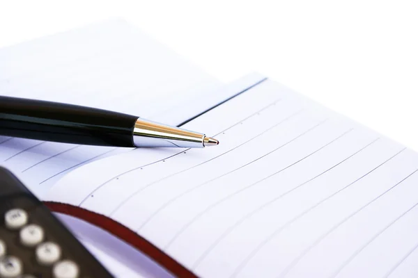 Στυλό Σημειωματάριο Και Αριθμομηχανή Που Απομονώνονται Λευκό Φόντο — Φωτογραφία Αρχείου
