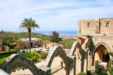 Historic Bellapais Abbey in Kyrenia, Northern Cyprus.Original construction was built between 1198-1205, it is the most beautiful Gothic building in the Near Eas clipart