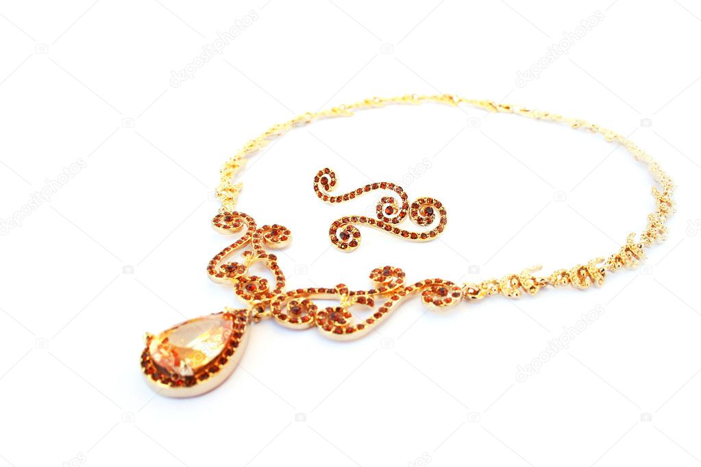 Necklaces and earrings isolated on white background.