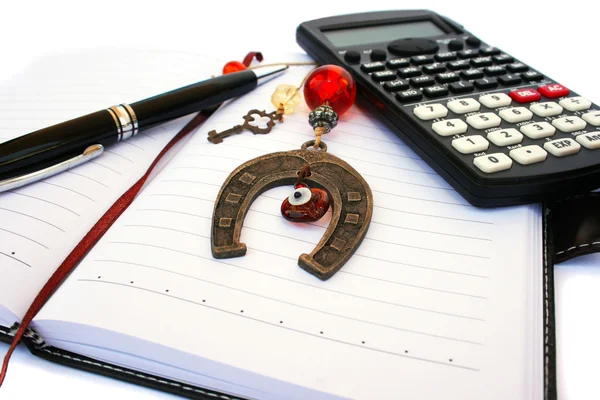 Calculator Pen Horseshoe Notebook Isolated White Background — Stock Photo, Image