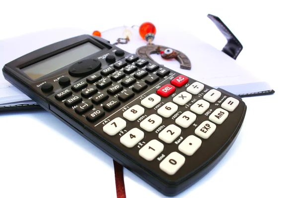 Calculator and notebook — Stock Photo, Image