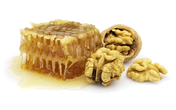 Honeycomb and walnuts — Stock Photo, Image