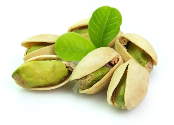 Dried pistachio with leaves — Stock Photo, Image