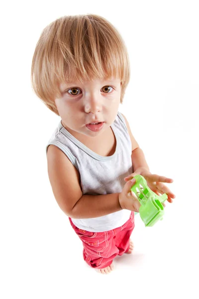 Funny little boy with toy — Stock Photo, Image