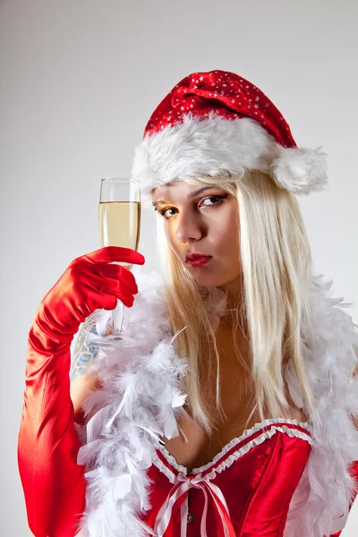 性感夫人圣诞老人与香槟杯 — 图库照片