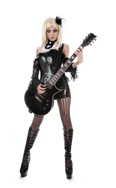 Сексуальная женщина с гитарой — стоковое фото