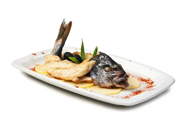 Fish baked in pastry with olives — Stock Image Fish baked in pastry with olives Stock Photo