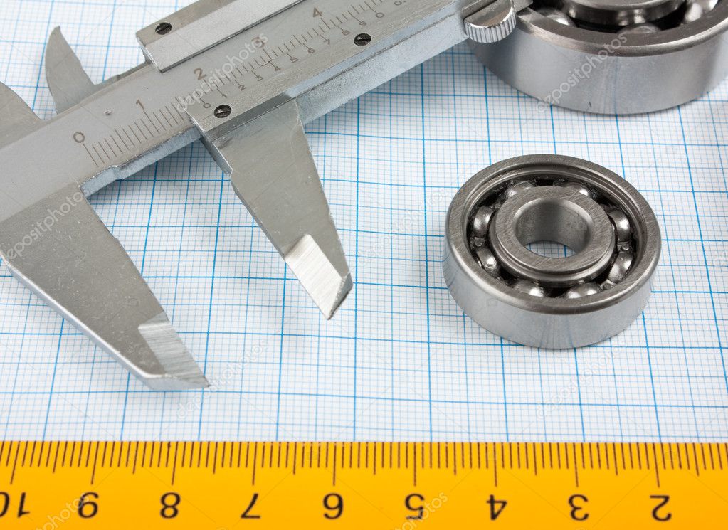 Setsquare And Calliper With Bearing — Stock Photo © Observer #5217324