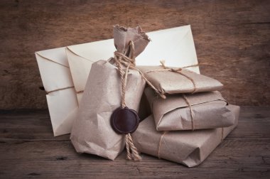 Pile parcel wrapped with brown kraft paper