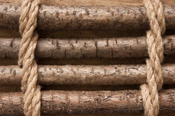 Wooden fence with rope — Stock Photo © Observer #5339670