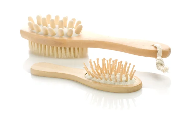 Escova de madeira e escova de cabelo — Fotografia de Stock