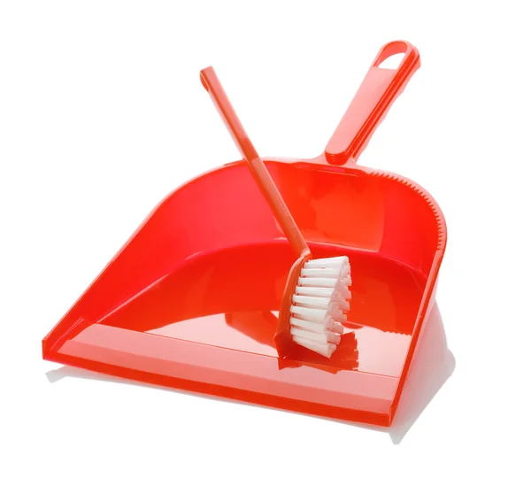Pó de plástico vermelho isolado com escova — Fotografia de Stock