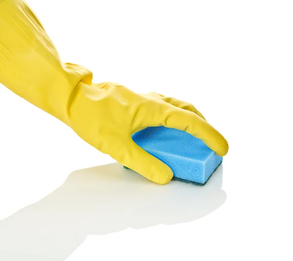 Рука в перчатке с синей губкой — стоковое фото