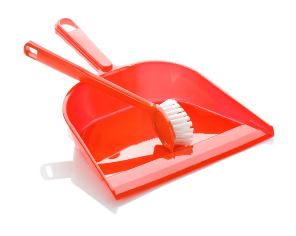 Red plastic dustpan with brush — Stock Photo, Image