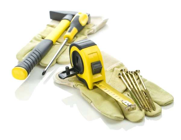 Set van tools op handschoenen — Stockfoto