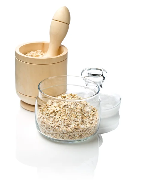 Jar and mortar with cereal — Stock Photo, Image