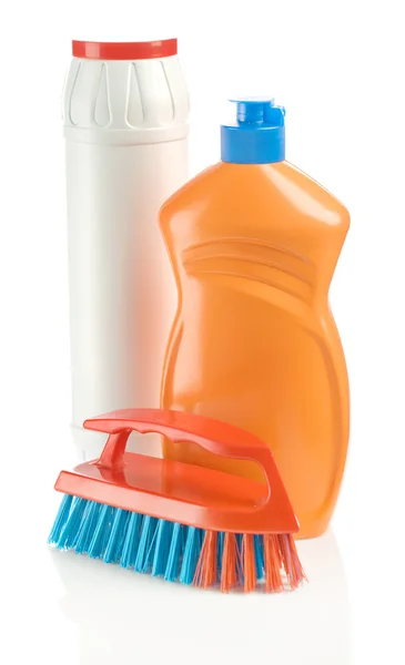 Weiße und orangefarbene Flaschen mit Pinsel — Stockfoto