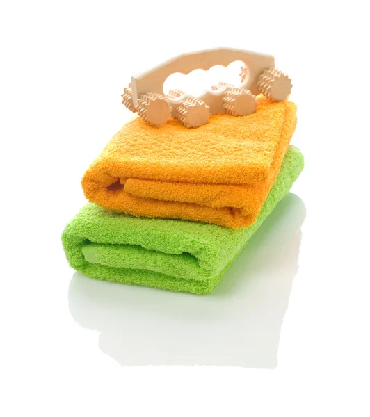 Massagegerät auf Handtüchern — Stockfoto