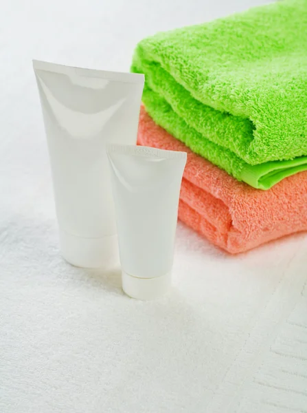 Tubes with colored towels — Stock Photo, Image
