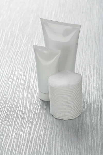 Tubes with cotton pads — Stock Photo, Image