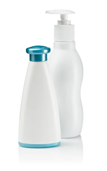 Butelki do opieki na białym tle — Zdjęcie stockowe