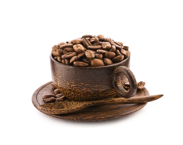 Tasse en bois brun de teck avec grains de café — Photo