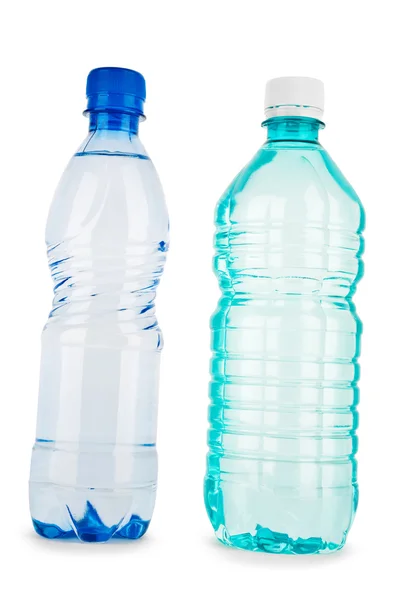 Botella azul y turquiosa con agua aislada sobre un fondo blanco —  Fotos de Stock