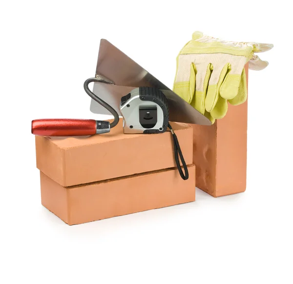Tijolos com ferramentas para construção — Fotografia de Stock