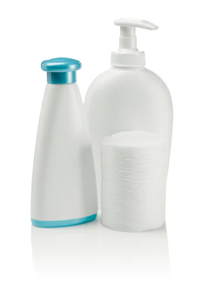 Almohadillas y botellas de algodón —  Fotos de Stock