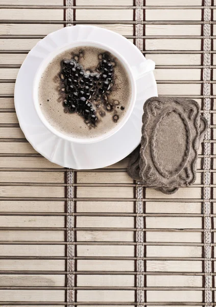 Koffie samenstelling van cappuchino op mat — Stockfoto
