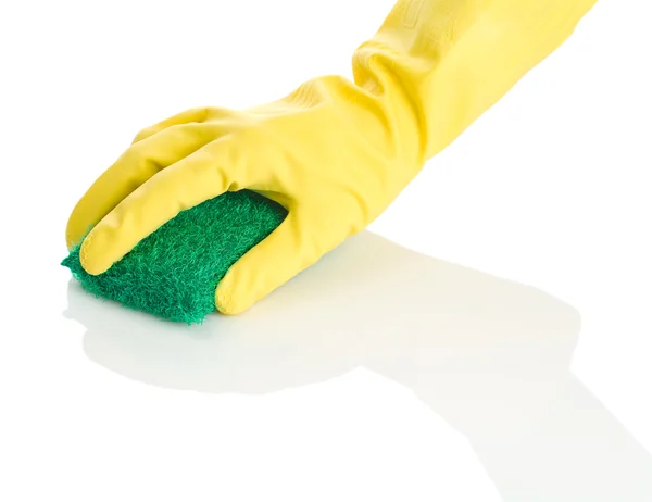 Hand met groene spons — Stockfoto