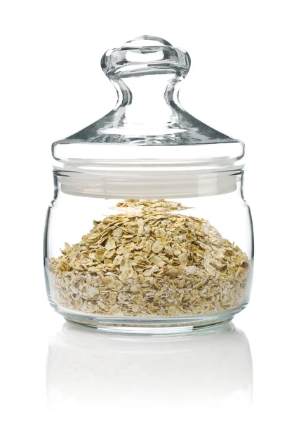 Jar with flakes — Stock Photo, Image