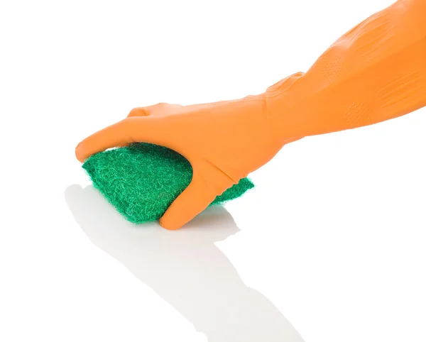 Hand in orangefarbenen Handschuh mit Schwamm — Stockfoto
