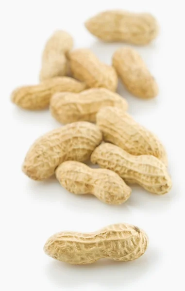 Peanuts on gray background isolated — Stock Photo, Image