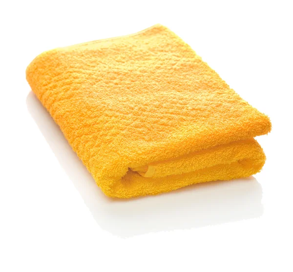 Одно оранжевое полотенце — стоковое фото