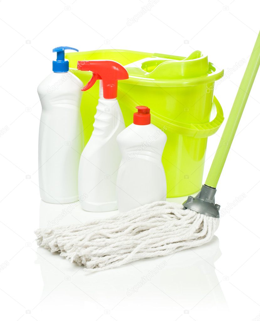 Bottles on a background of the bucket and mop