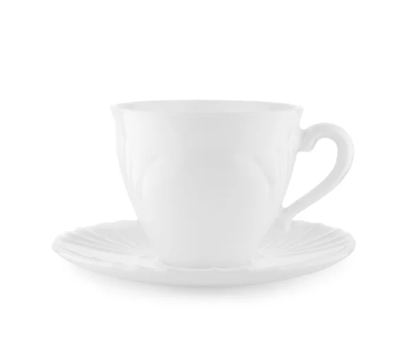 Белая чашка на изолированной тарелке — стоковое фото