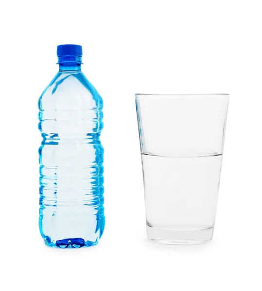 Små blå botlle och stora glas med vatten — Stockfoto
