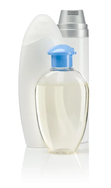 Tres botellas de cuidado blanco — Foto de Stock