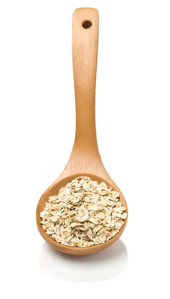 Wooden spoon with cereal — Stock Photo, Image