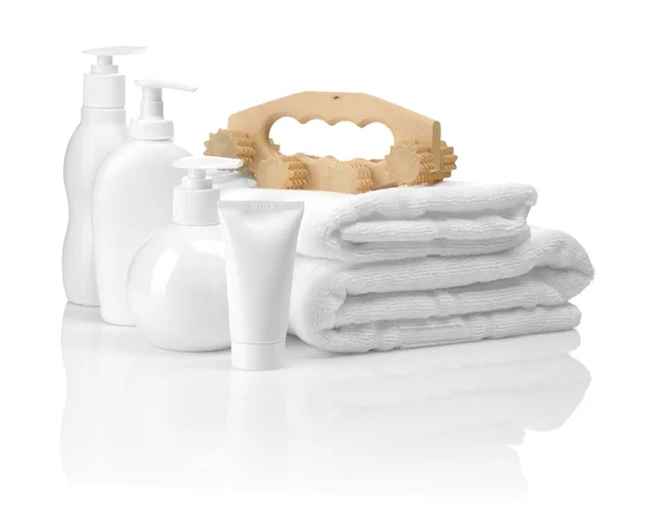 Artigos de banho brancos com massageador — Fotografia de Stock