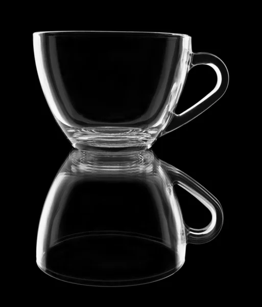 Transparent cup with reflection on black — Stock Photo, Image